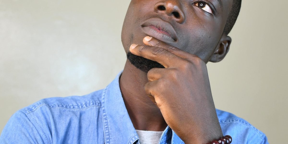 A person having an 'aha' moment, connecting the dots and finding something humorous.