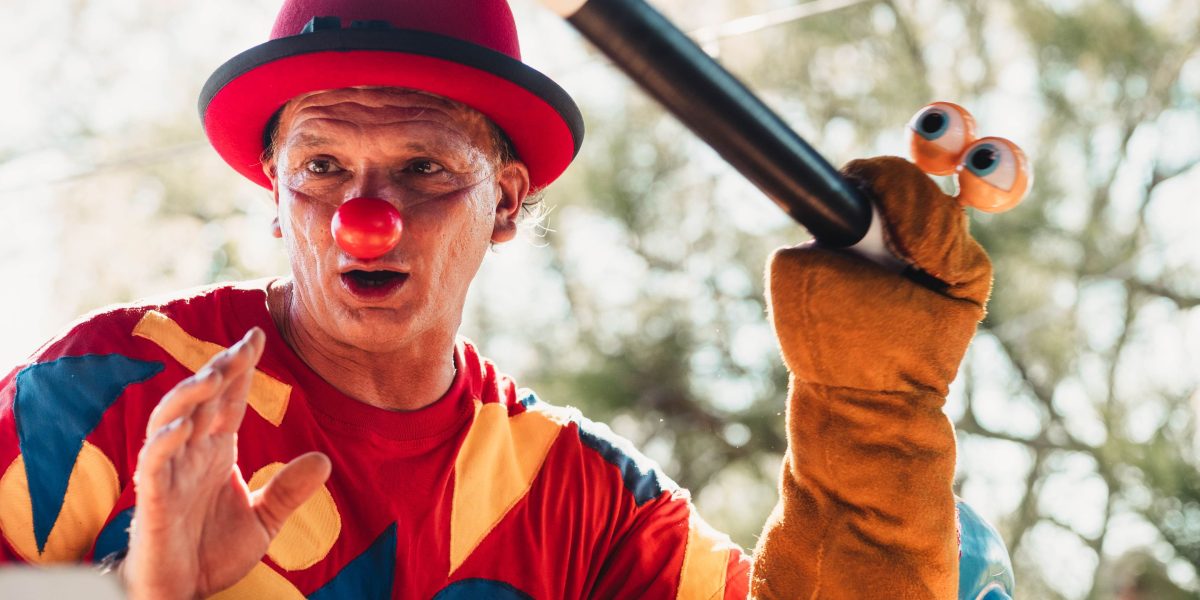 A person exhibiting a pompous attitude in a lighthearted, humorous setting for comedic effect.